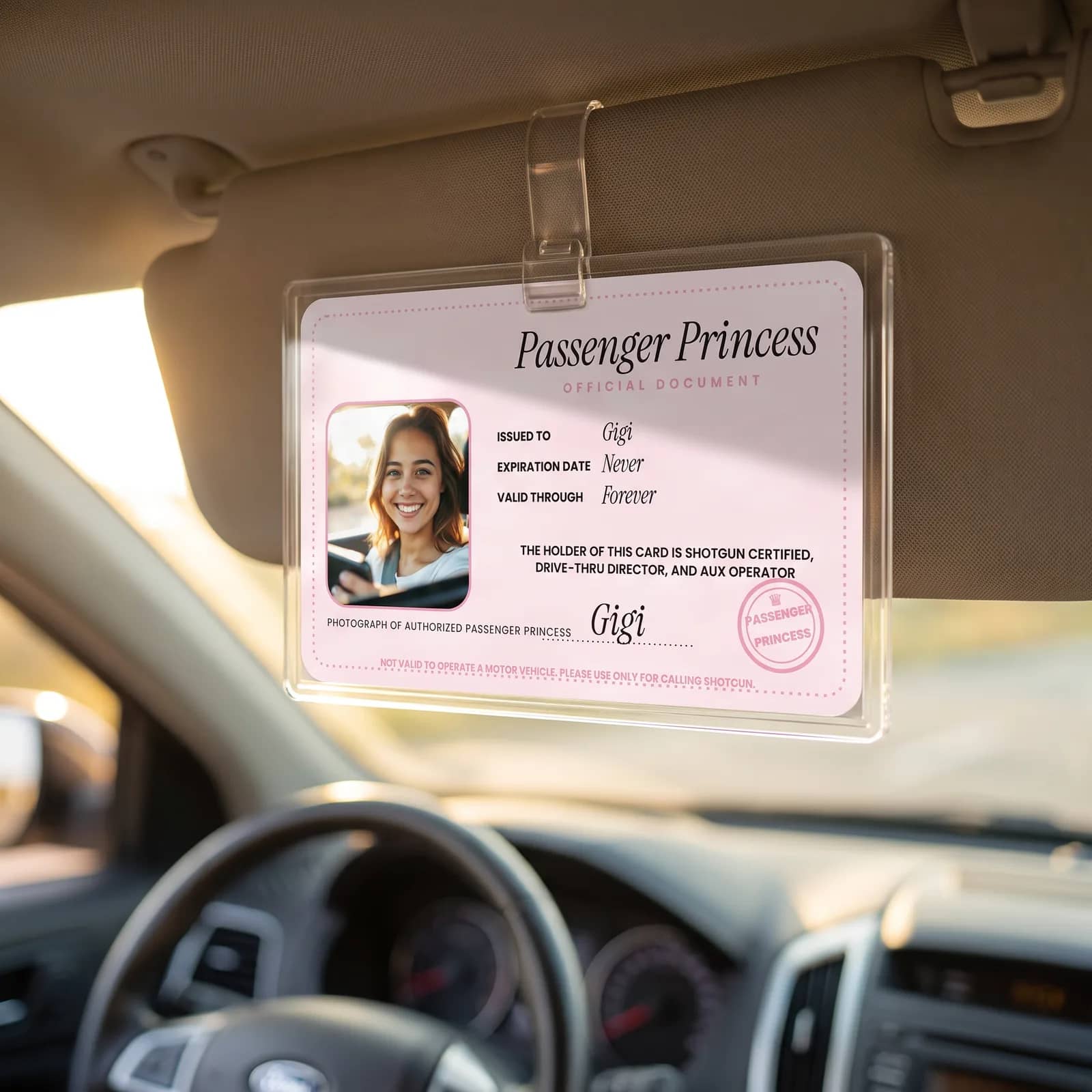 Personalized Passenger Princess Card clipped to a car sun visor
