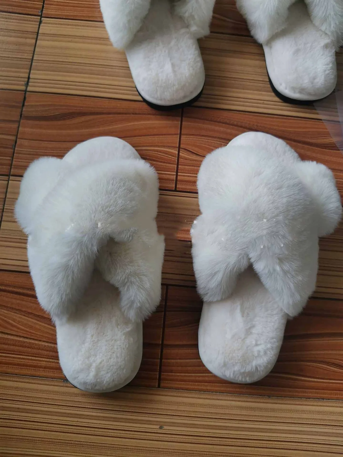 Cloud Cross-Strap Fuzzy Slippers in Oat, flat lay