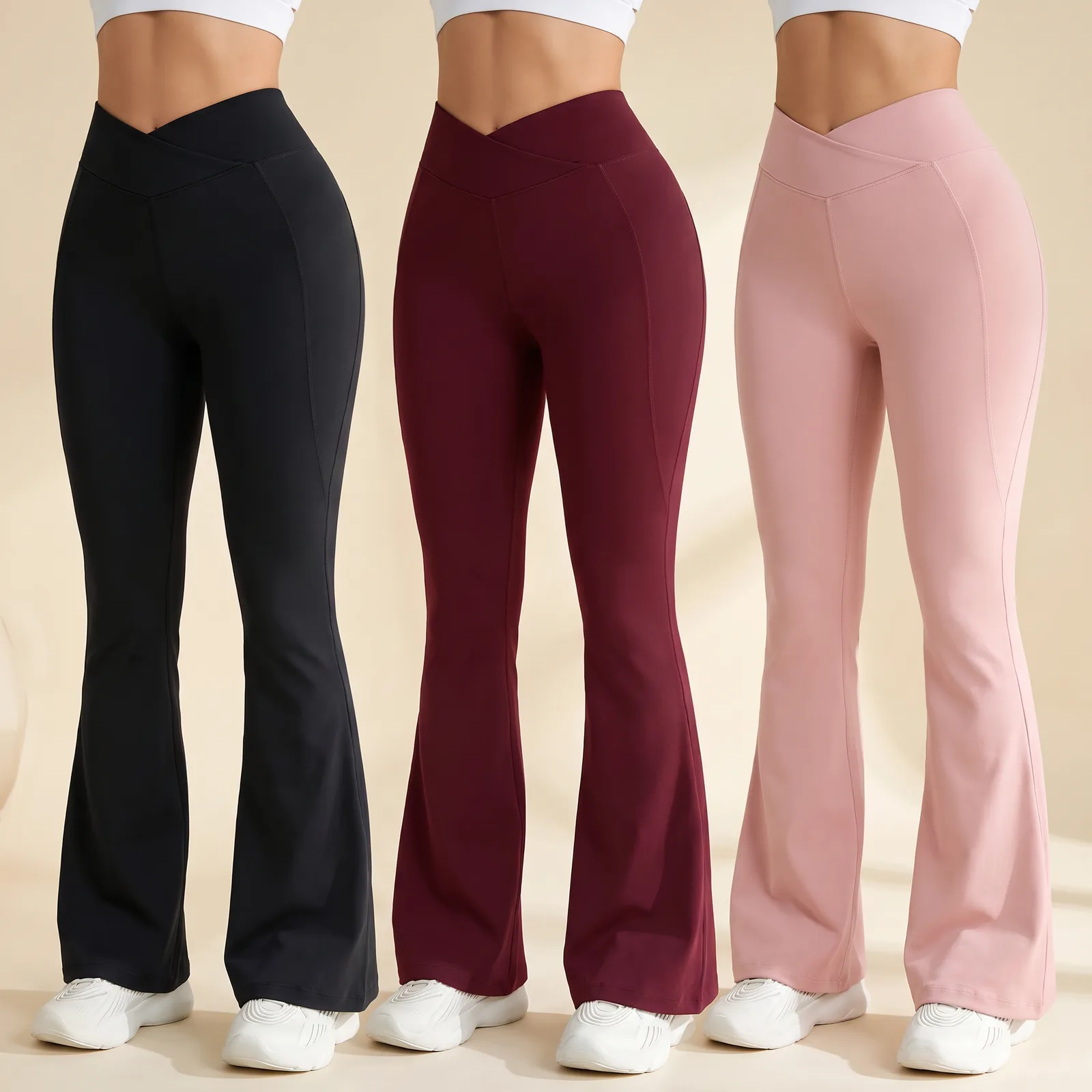 Black, Burgundy, and Blush crossover flare pants lined up side by side