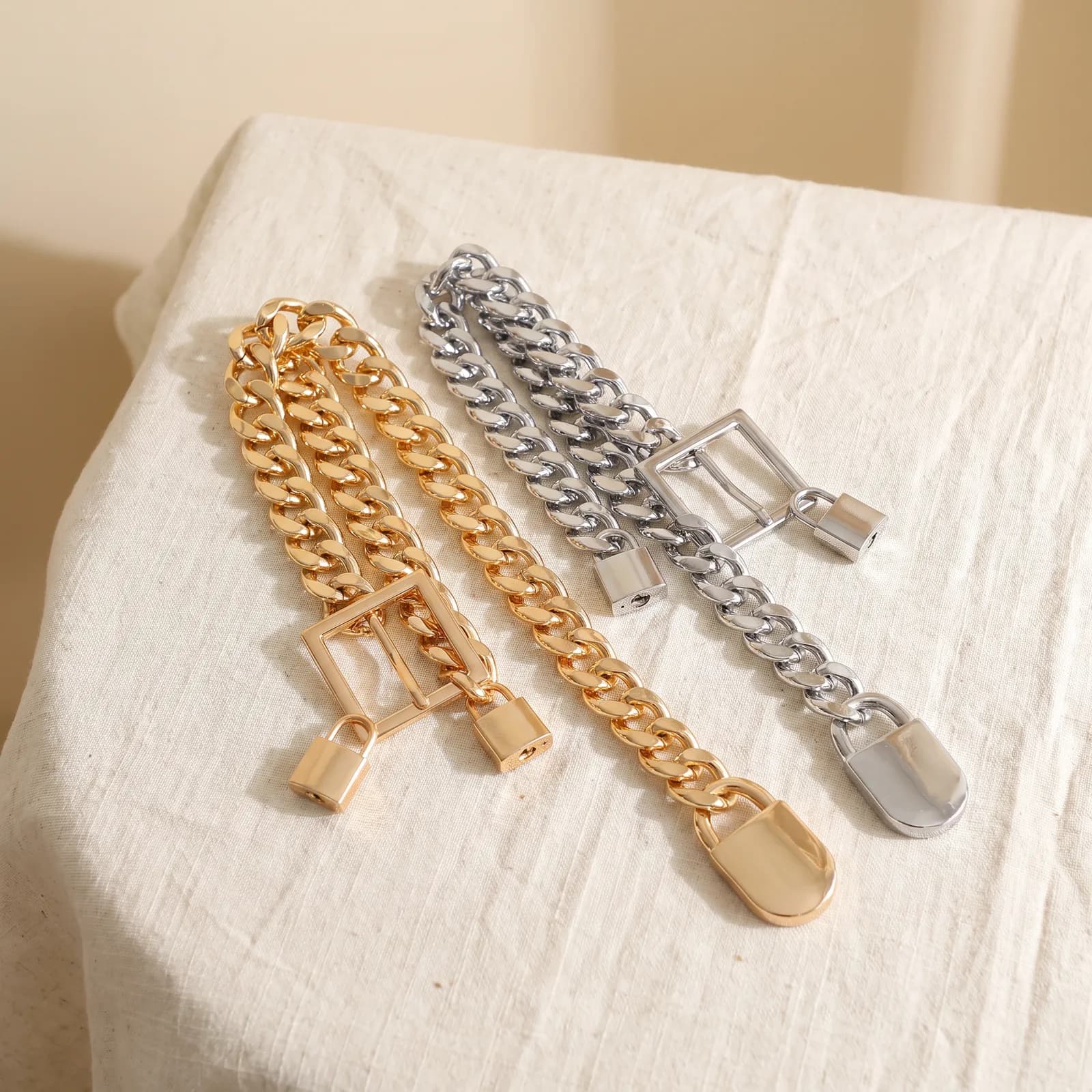 Gold and Silver chain belts laid side by side