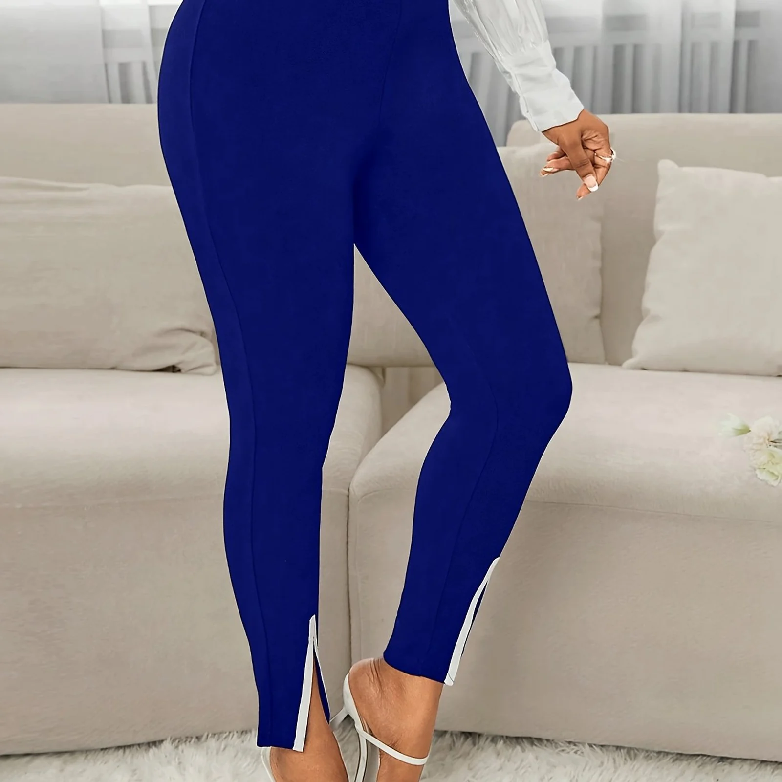 The Royal Blue slim work pants worn with heels