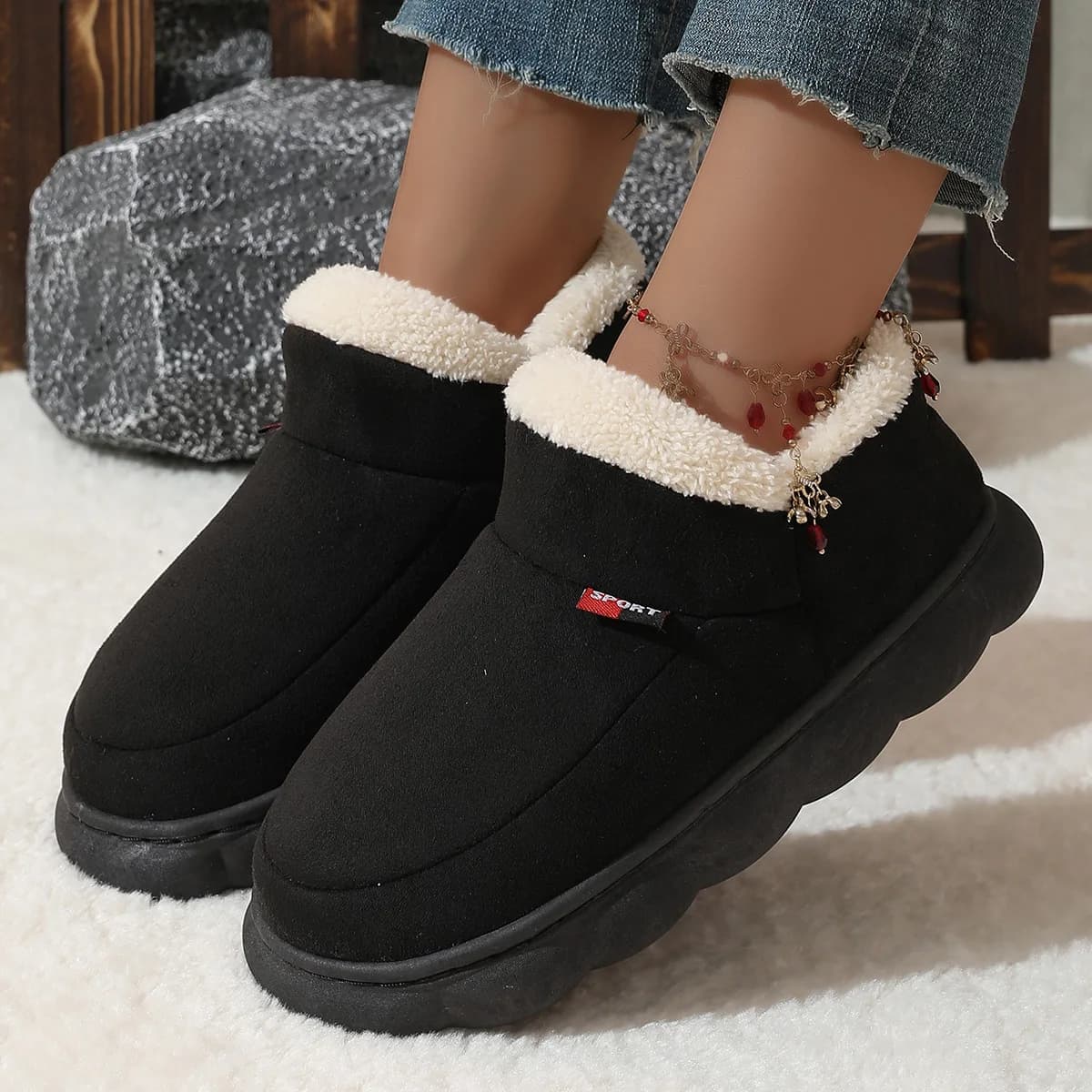 Suede Fleece-Lined House Shoes in Black, worn by a model