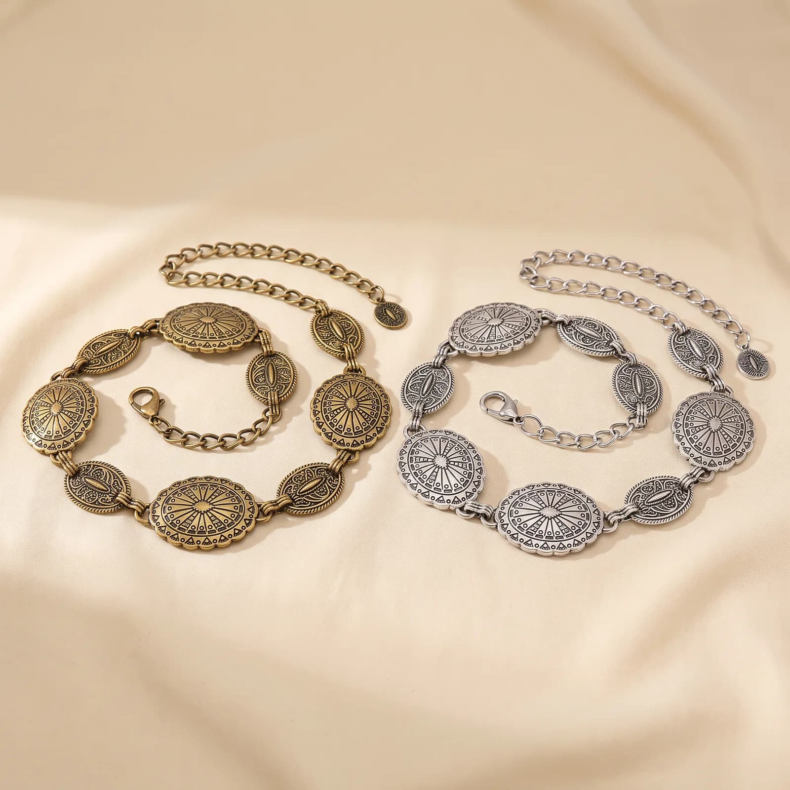 Antique Gold and Silver concho belts laid side by side