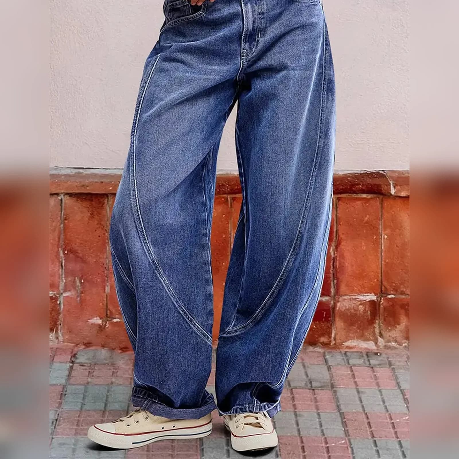 The barrel jeans from the front, showing the curved leg