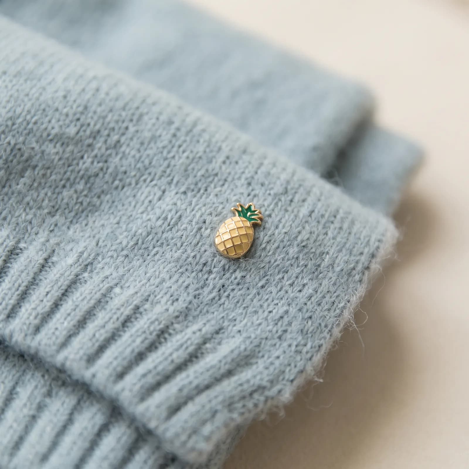 Close-up of the fringe trim and the thick knit weave