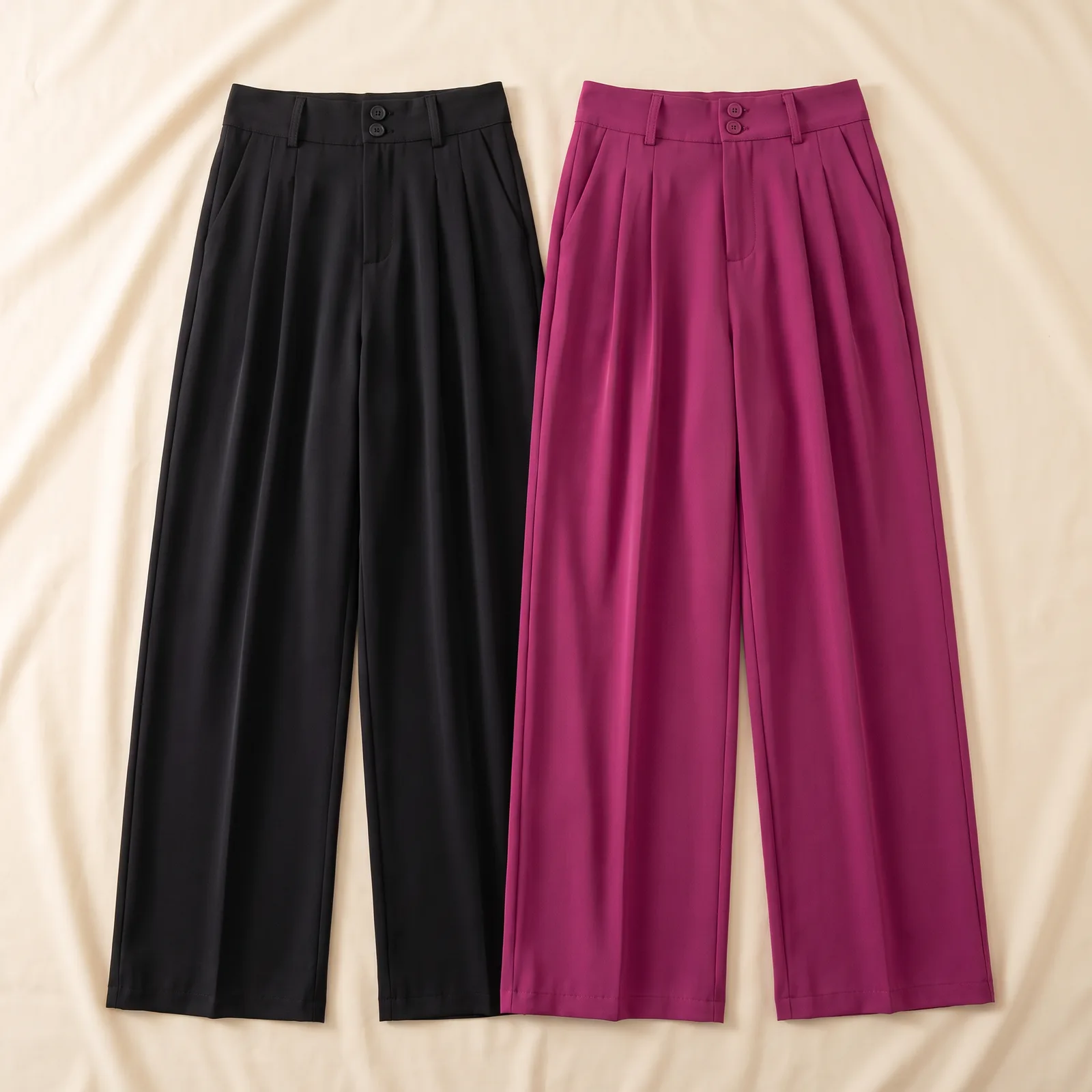 Black and Magenta trousers laid side by side