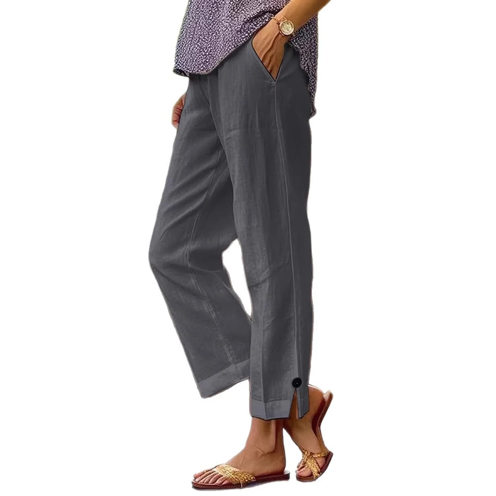 The Grey linen-blend pants from the side, showing the pocket and cropped hem
