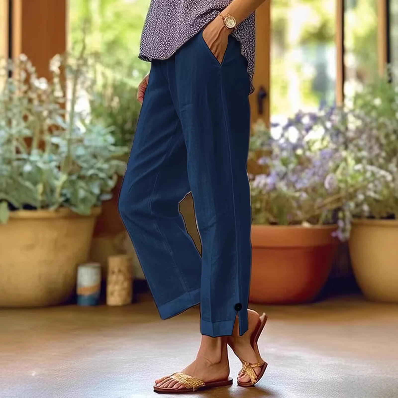 The Navy linen-blend pants worn with sandals