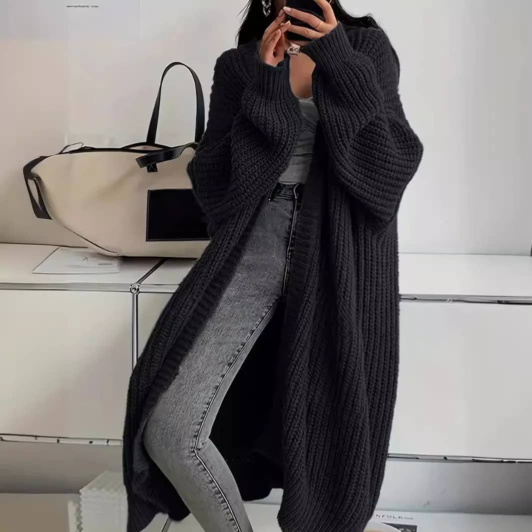 Longline Pocket Knit Cardigan in Black, worn by a model