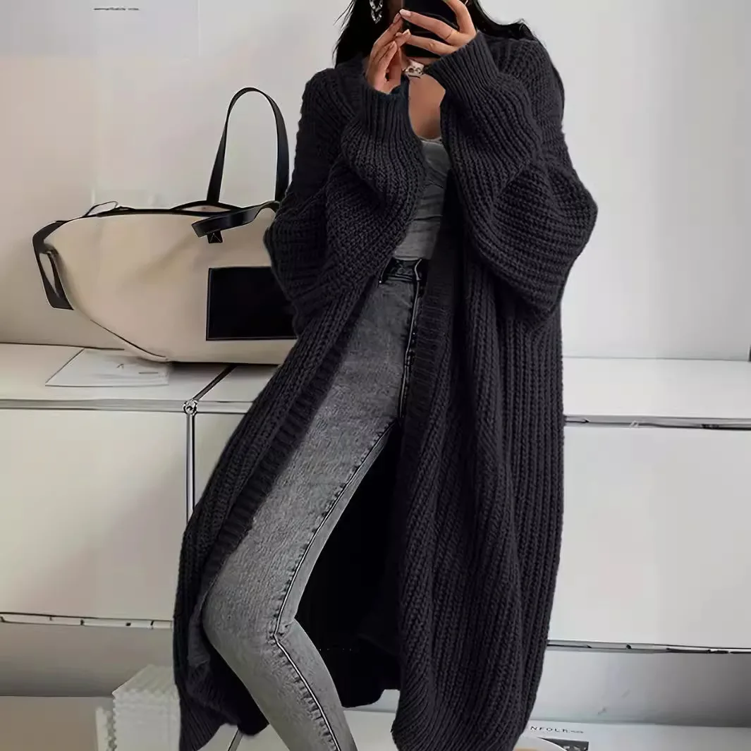 Longline Pocket Knit Cardigan in Black, worn by a model
