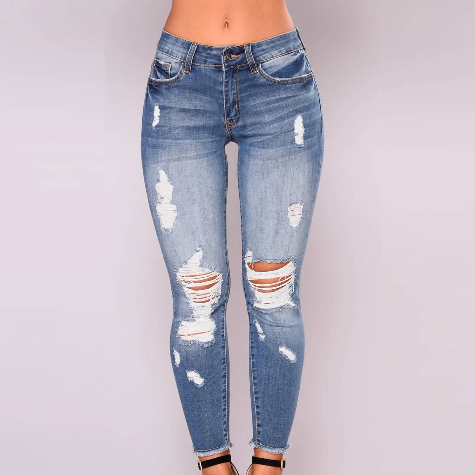 Ripped Skinny Jeans in Light Wash from the front, knee rips visible