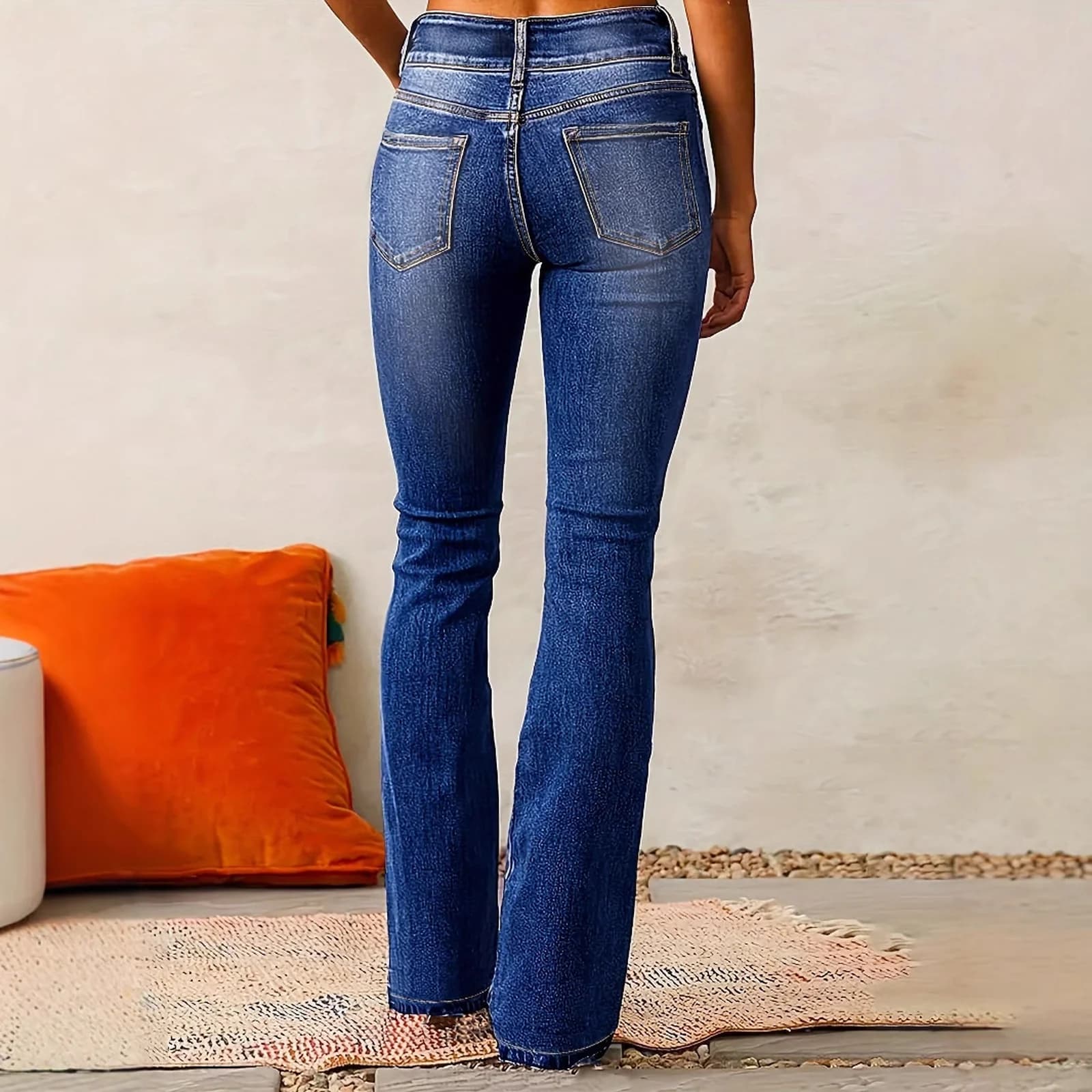 Back view of the Dark Wash bootcut showing the stitched back pockets