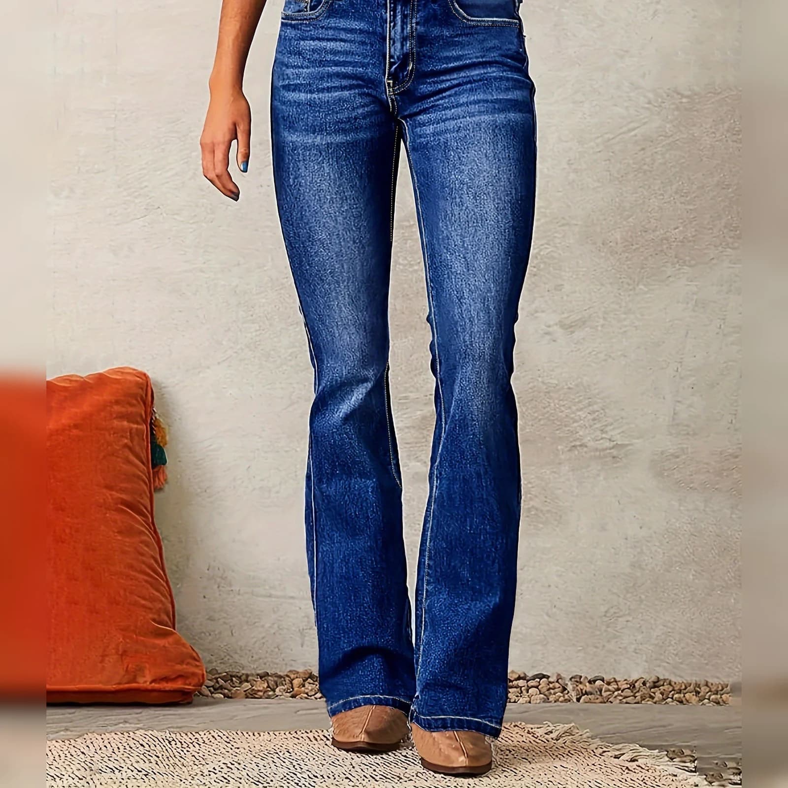 Stretch Bootcut Jeans in Dark Wash worn full length with a cream top