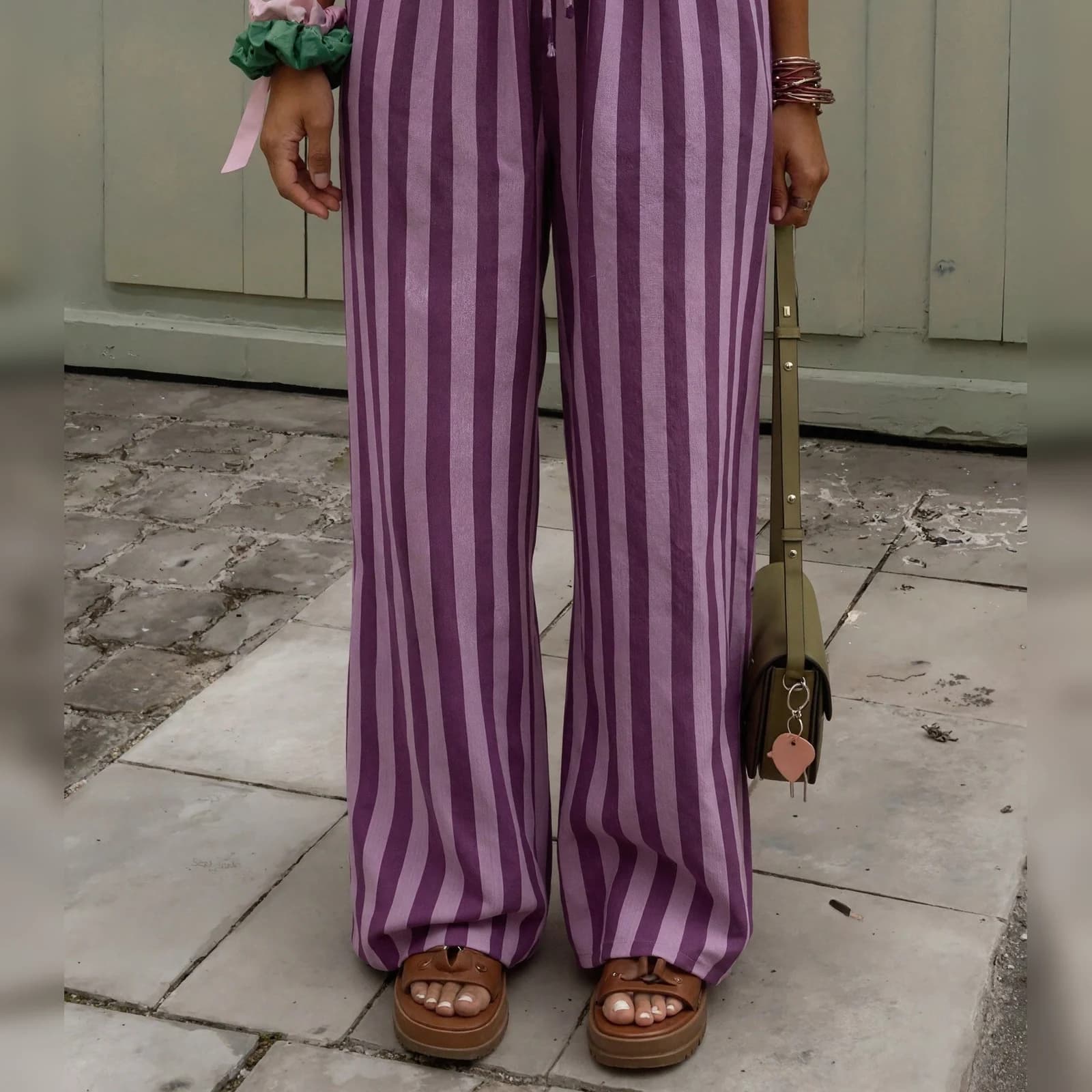 The Plum Stripe palazzo pants worn full length