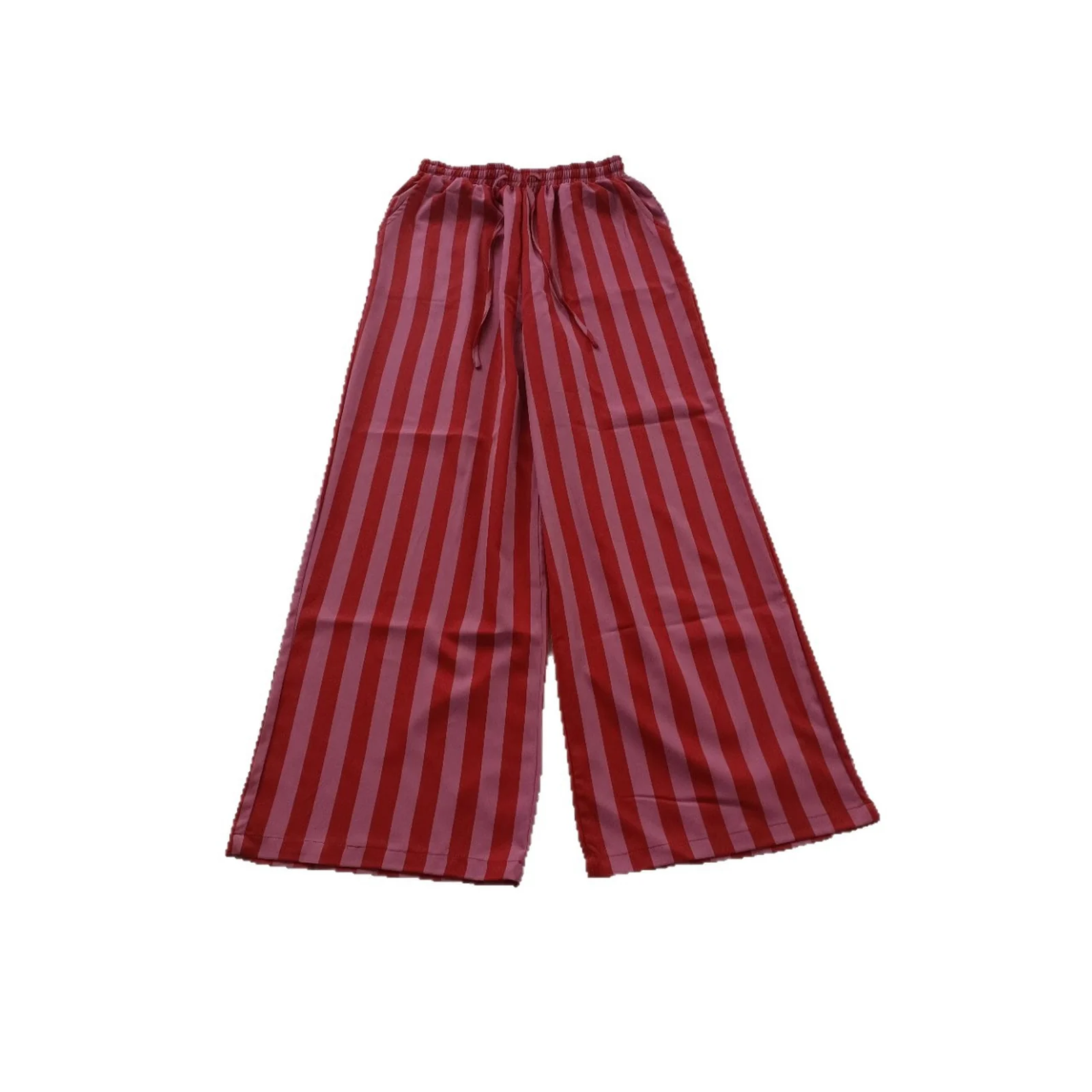The Red Stripe palazzo pants laid flat against white