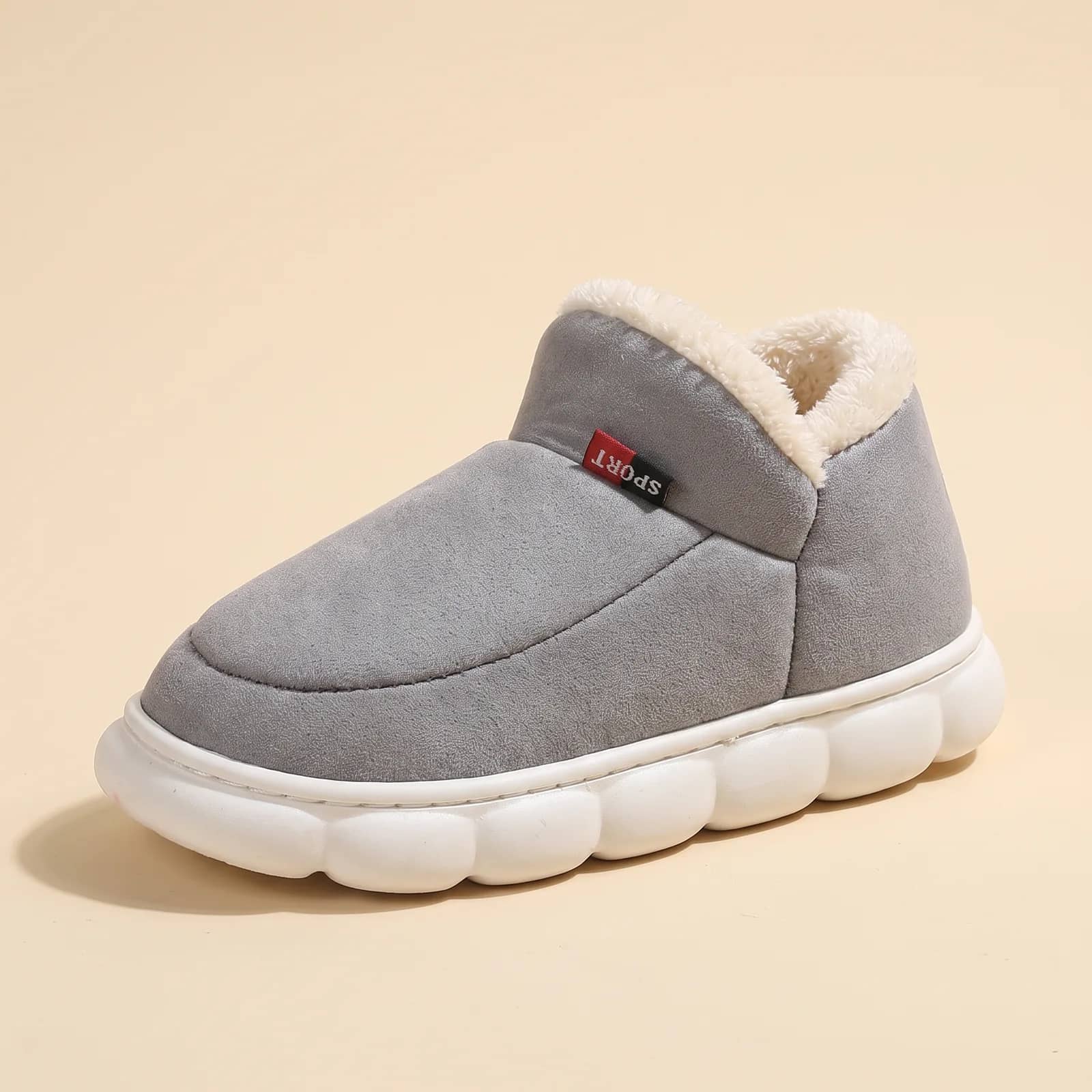 Suede Fleece-Lined House Shoes in Chestnut on a cream studio background