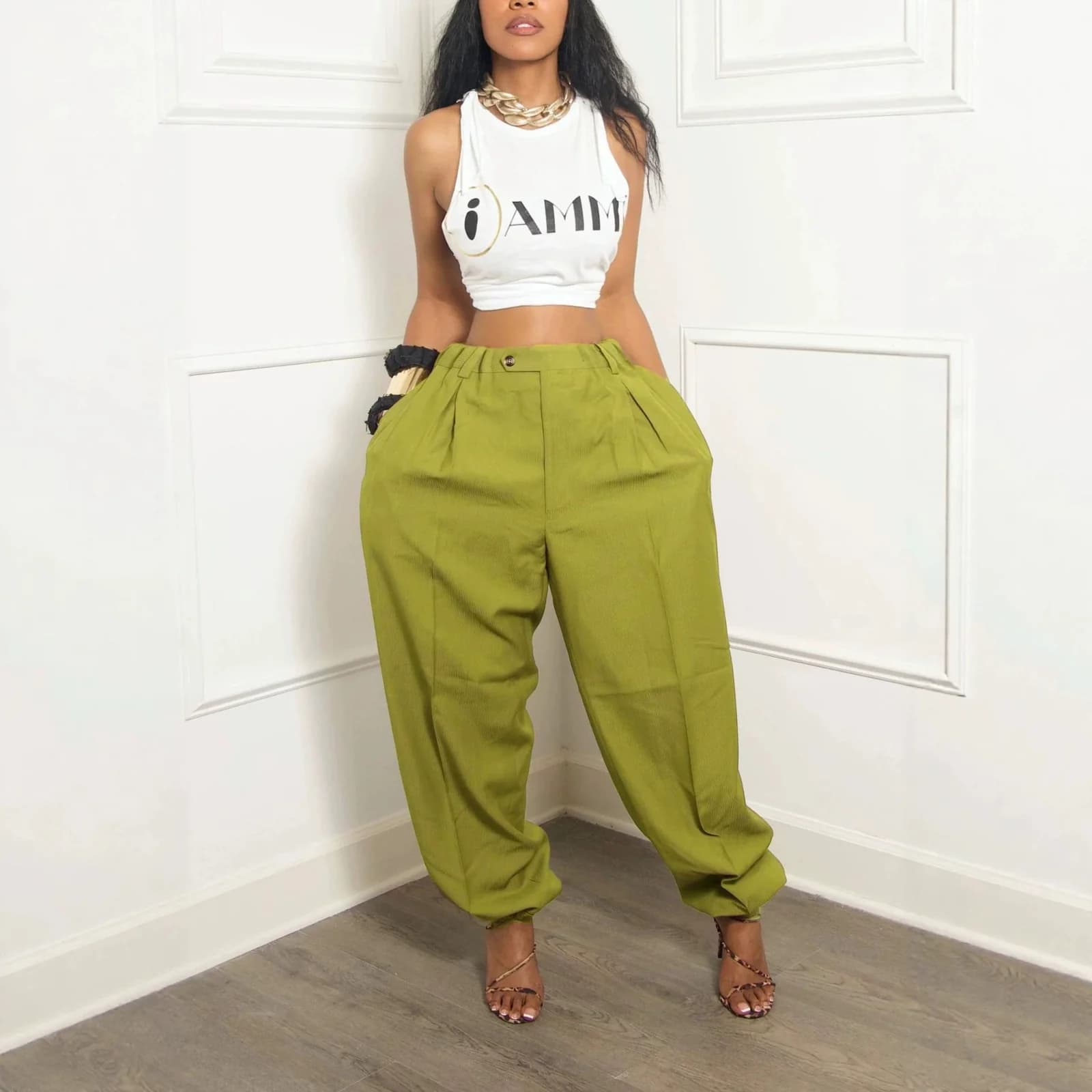 The Lime barrel travel pants worn with a white top