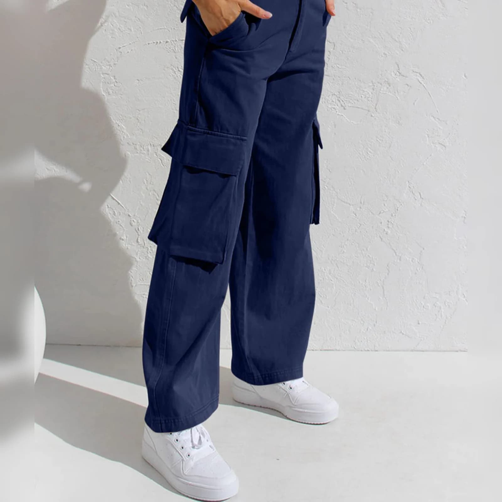 The Navy cargo pants worn full length