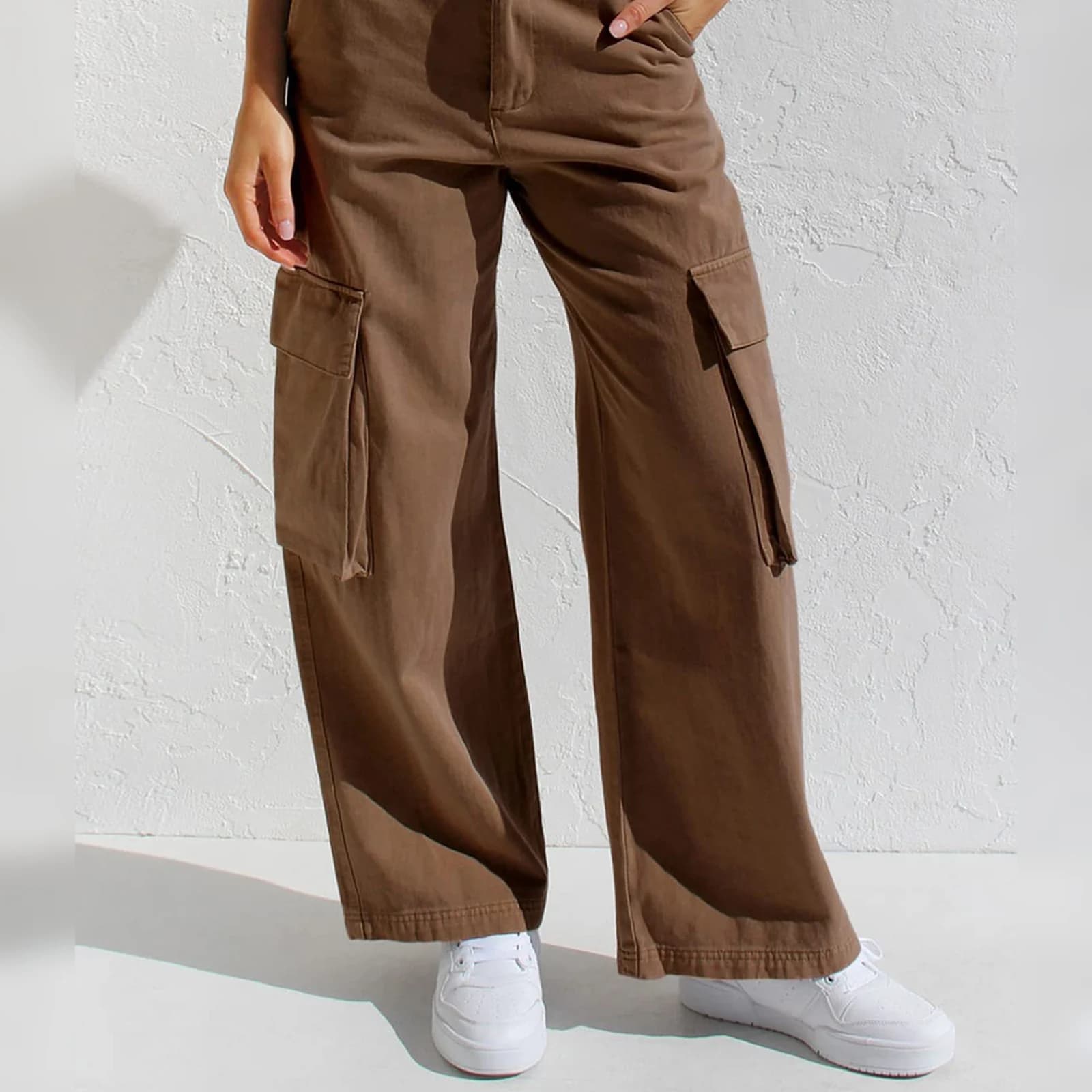 The Brown cargo pants worn full length, showing the flap cargo pocket