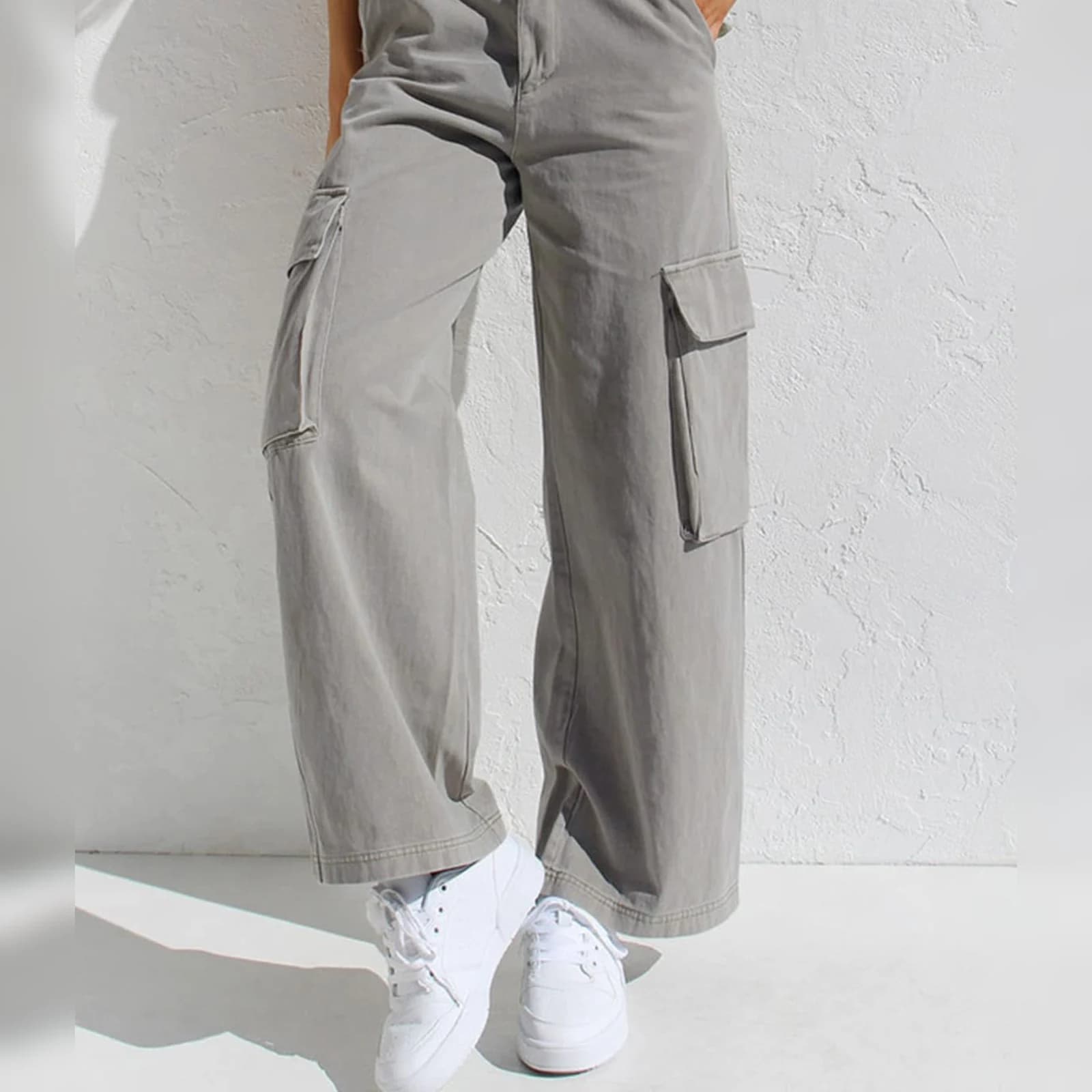 The Light Grey cargo pants worn full length