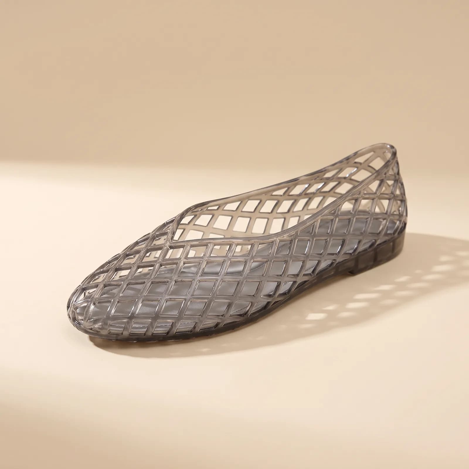 Woven Jelly Ballet Flats in Smoke on a cream studio background